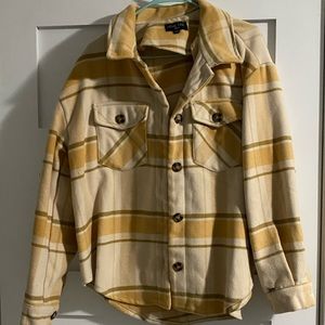 Yellow and tan colored shacket. Never worn. Bought from boutique online for $60
